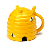 Tasse en céramique à l’envers de la ruche