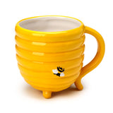 Tasse en céramique à l’envers de la ruche
