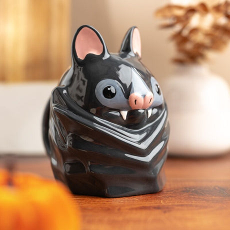 Tasse à l’envers en céramique chauve-souris