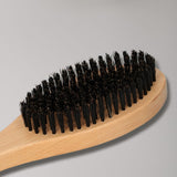 Brosse de bain amusante en poils de bois