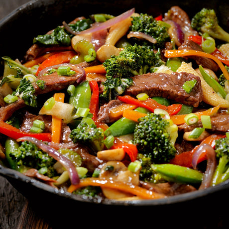 Wok en acier au carbone Kamado Joe® – pour des sautés authentiques sur le barbecue Kamado