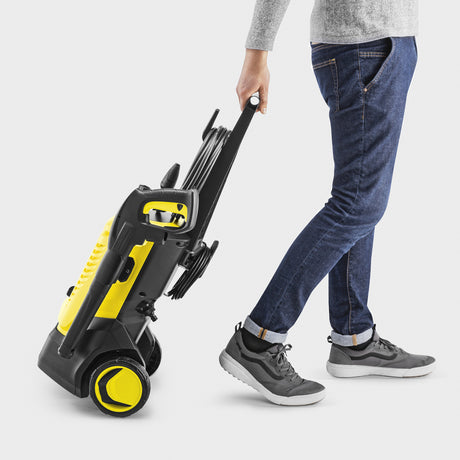 Nettoyeur haute pression domestique Kärcher k 5 wcm premium (jaune noir, avec nettoyeur haute pression, enrouleur de tuyau et nettoyant de surface)