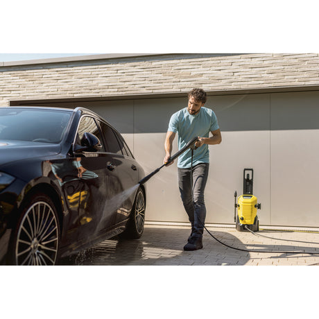 Nettoyeur haute pression domestique Kärcher k 5 wcm premium (jaune noir, avec nettoyeur haute pression, enrouleur de tuyau et nettoyant de surface)