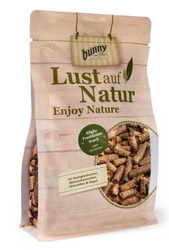 Naturaleza del conejito Disfruta de la naturaleza Allgau Freshgreen Snack con diente de león